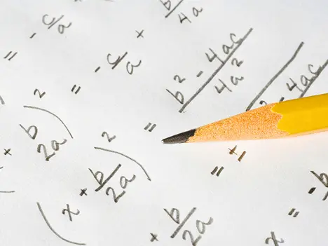 Pre-Algebra handwritten equations with pencil used for ACT online coaching practice
